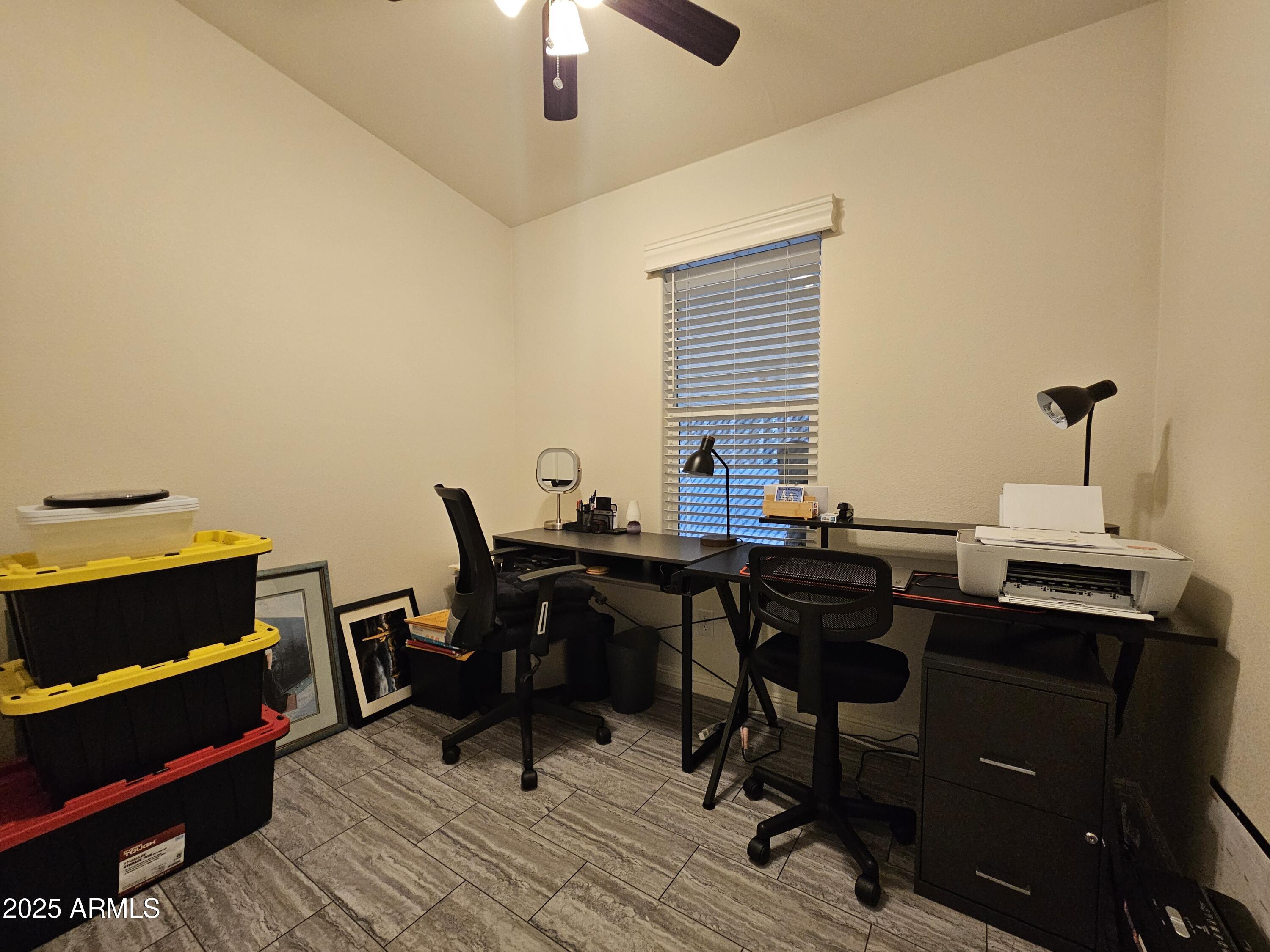 650 North Hawes Road, Unit 3124 Mesa, AZ 85207 - Photo 20 of 45 a view of a workspace with furniture