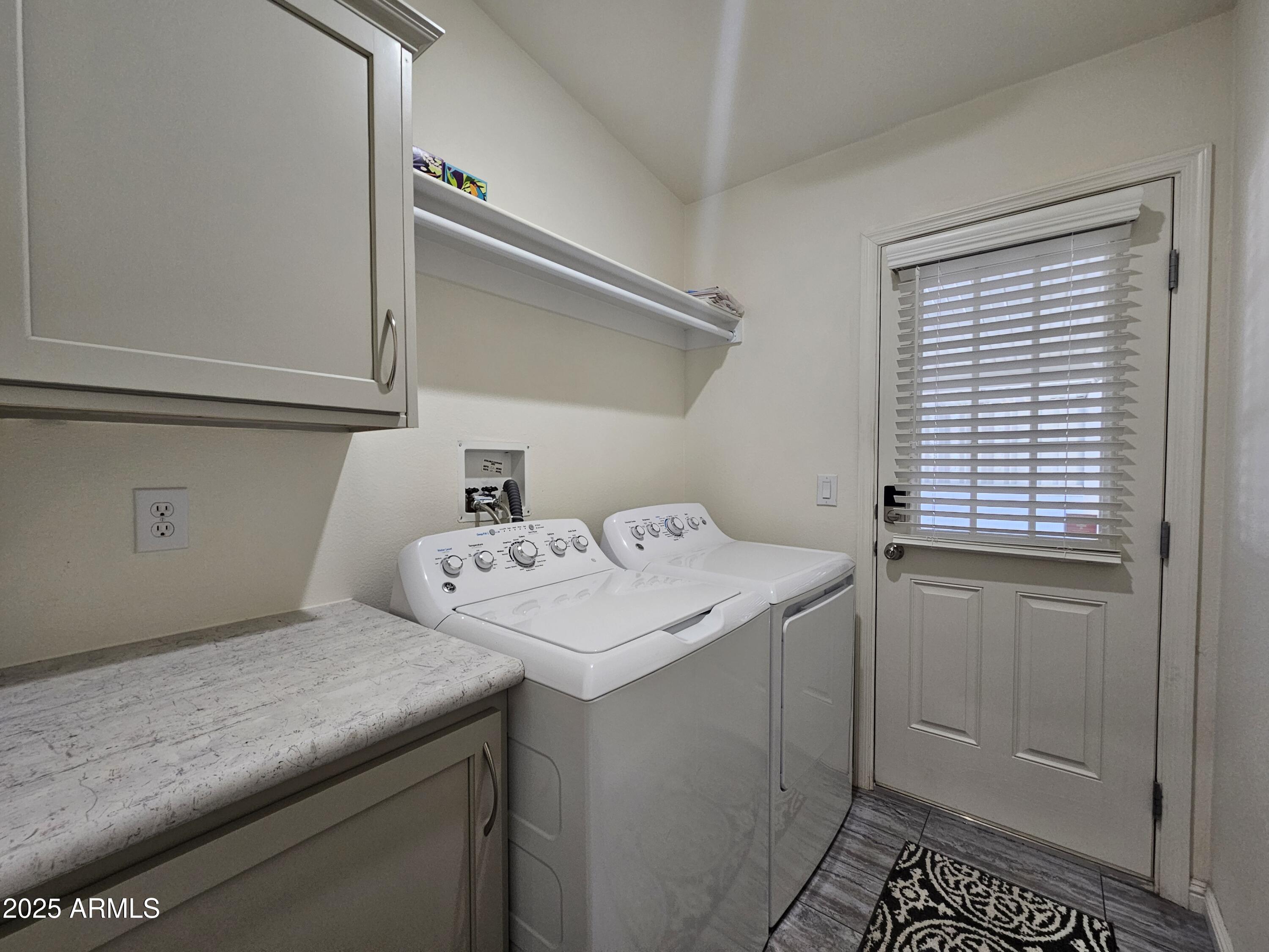 650 North Hawes Road, Unit 3124 Mesa, AZ 85207 - Photo 24 of 45 a utility room with dryer and washer