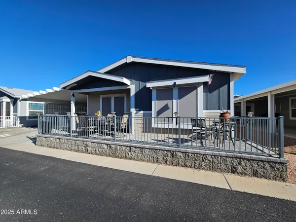 a front view of a house with a porch