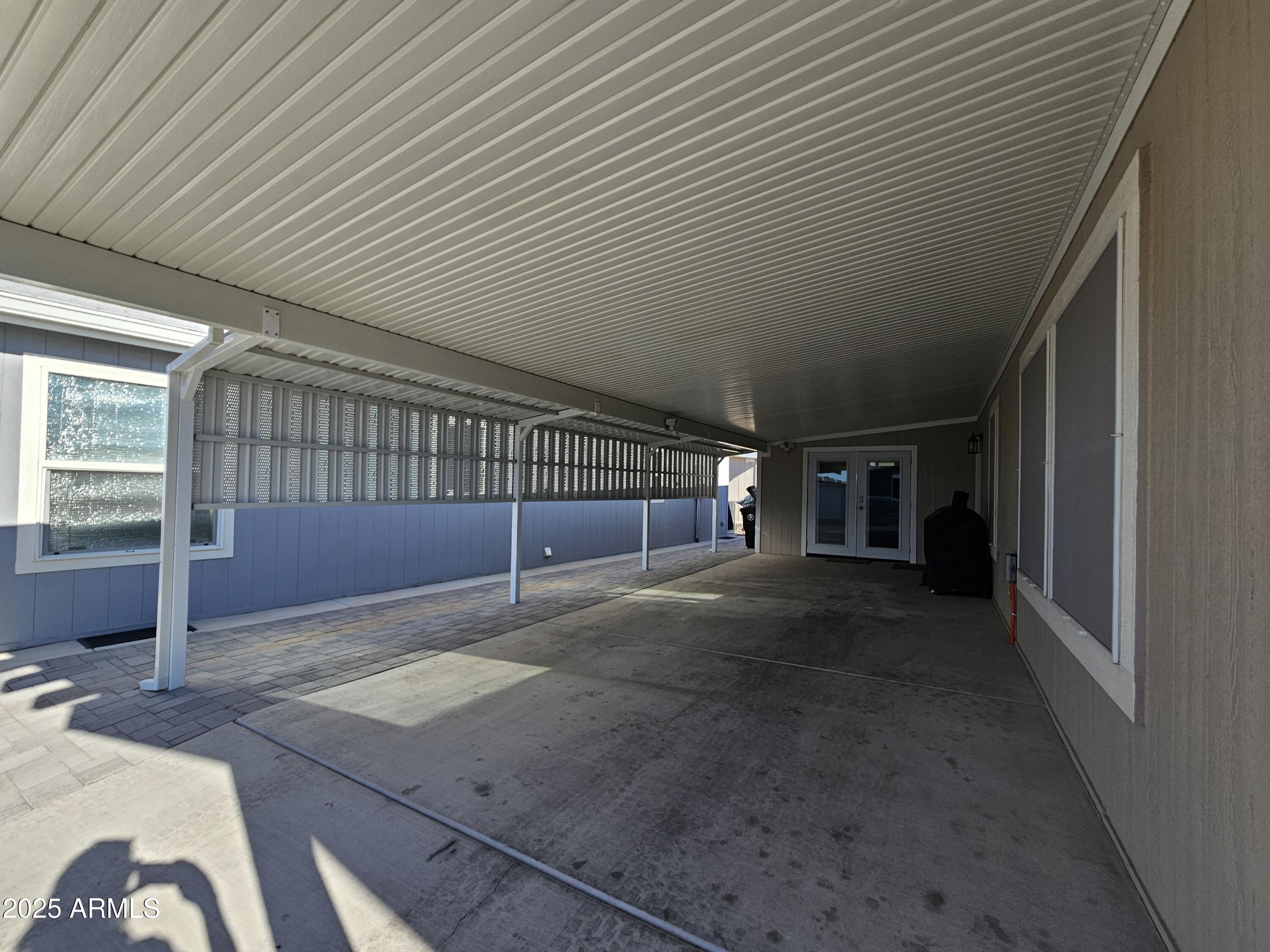 650 North Hawes Road, Unit 3124 Mesa, AZ 85207 - Photo 9 of 45 a view of entryway and hall with wooden floor