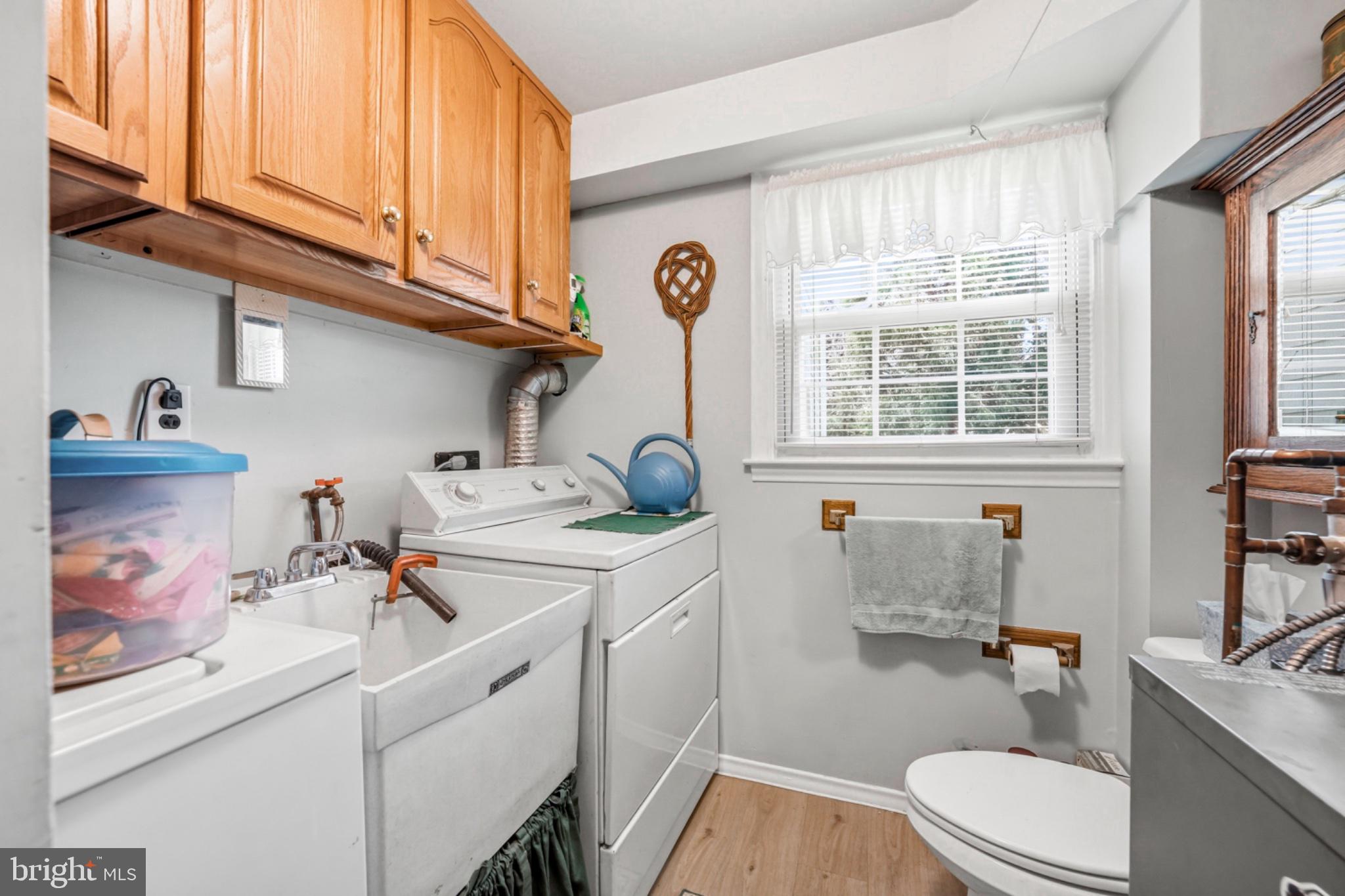 6 Laurel Lane Media, PA 19063 - Photo 20 of 52 a bathroom with a sink a toilet and a window