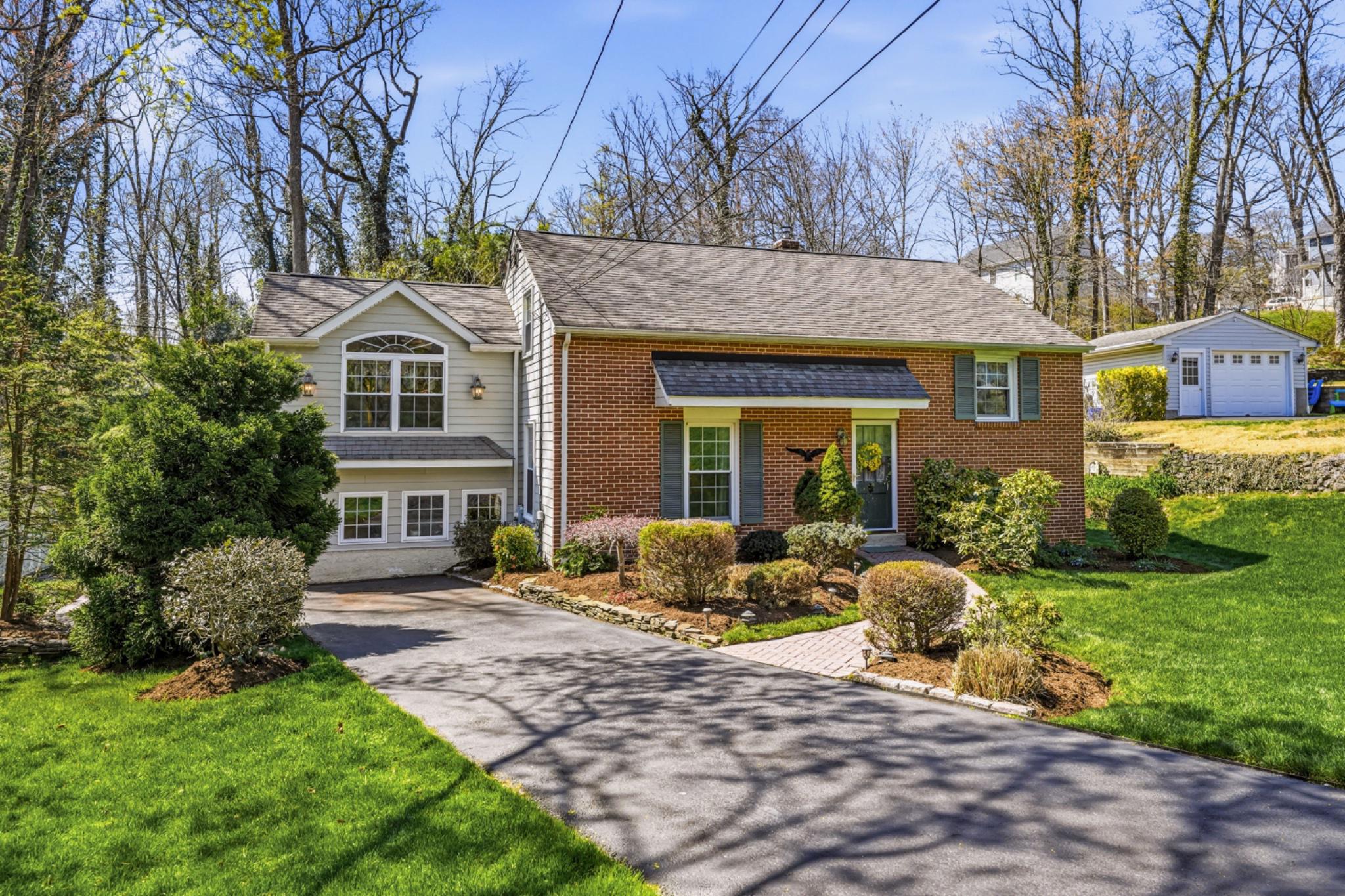 6 Laurel Lane Media, PA 19063 - Photo 2 of 52 a front view of a house with garden