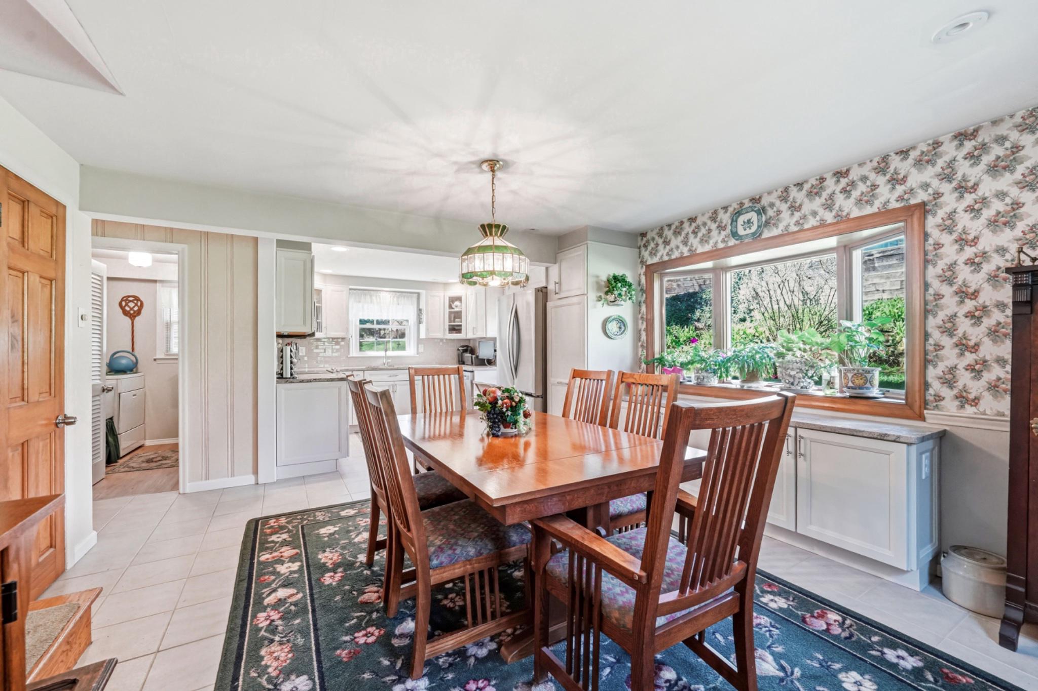 6 Laurel Lane Media, PA 19063 - Photo 21 of 52 a dining room with furniture a chandelier and wooden floor