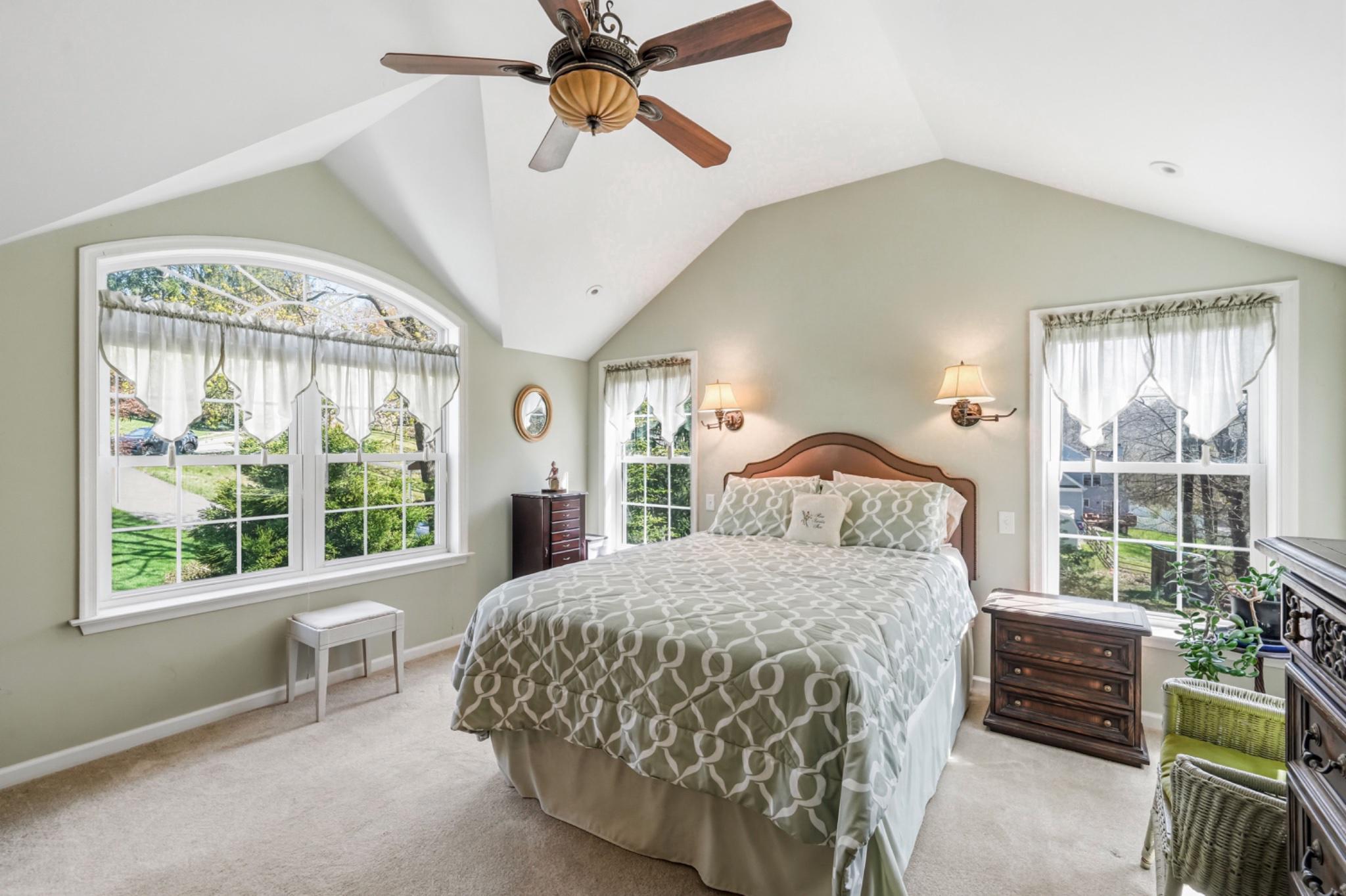 6 Laurel Lane Media, PA 19063 - Photo 30 of 52 a bedroom with a large bed and a large window