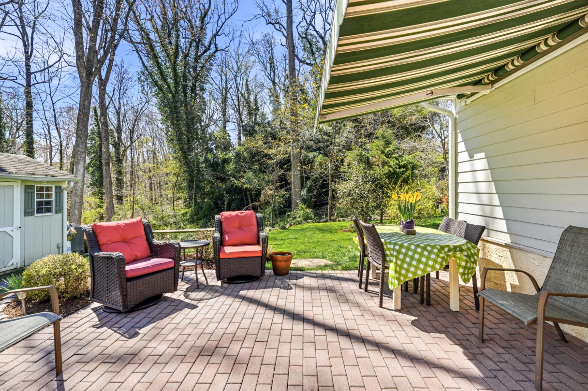 6 Laurel Lane Media, PA 19063 - Photo 5 of 52 a view of a patio with table and chairs and potted plants