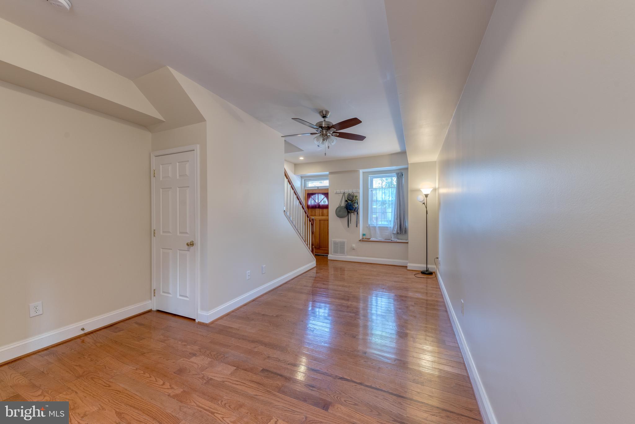 1818 Bank Street Baltimore, MD 21231 - Photo 4 of 20 a view of a hallway with wooden floor