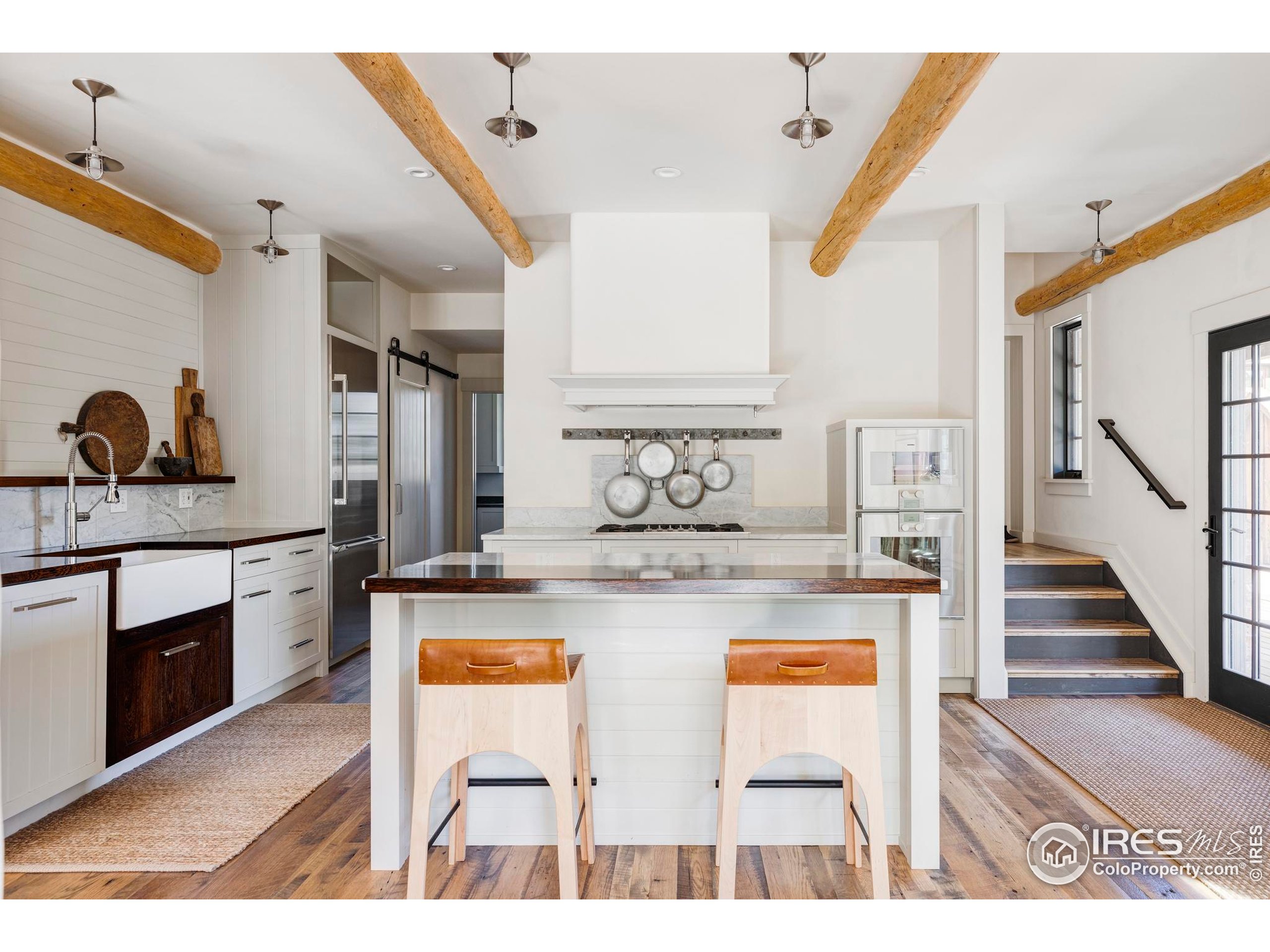 15789 North 83rd Street Longmont, CO 80503 - Photo 13 of 40 a view of kitchen with cabinets and stove