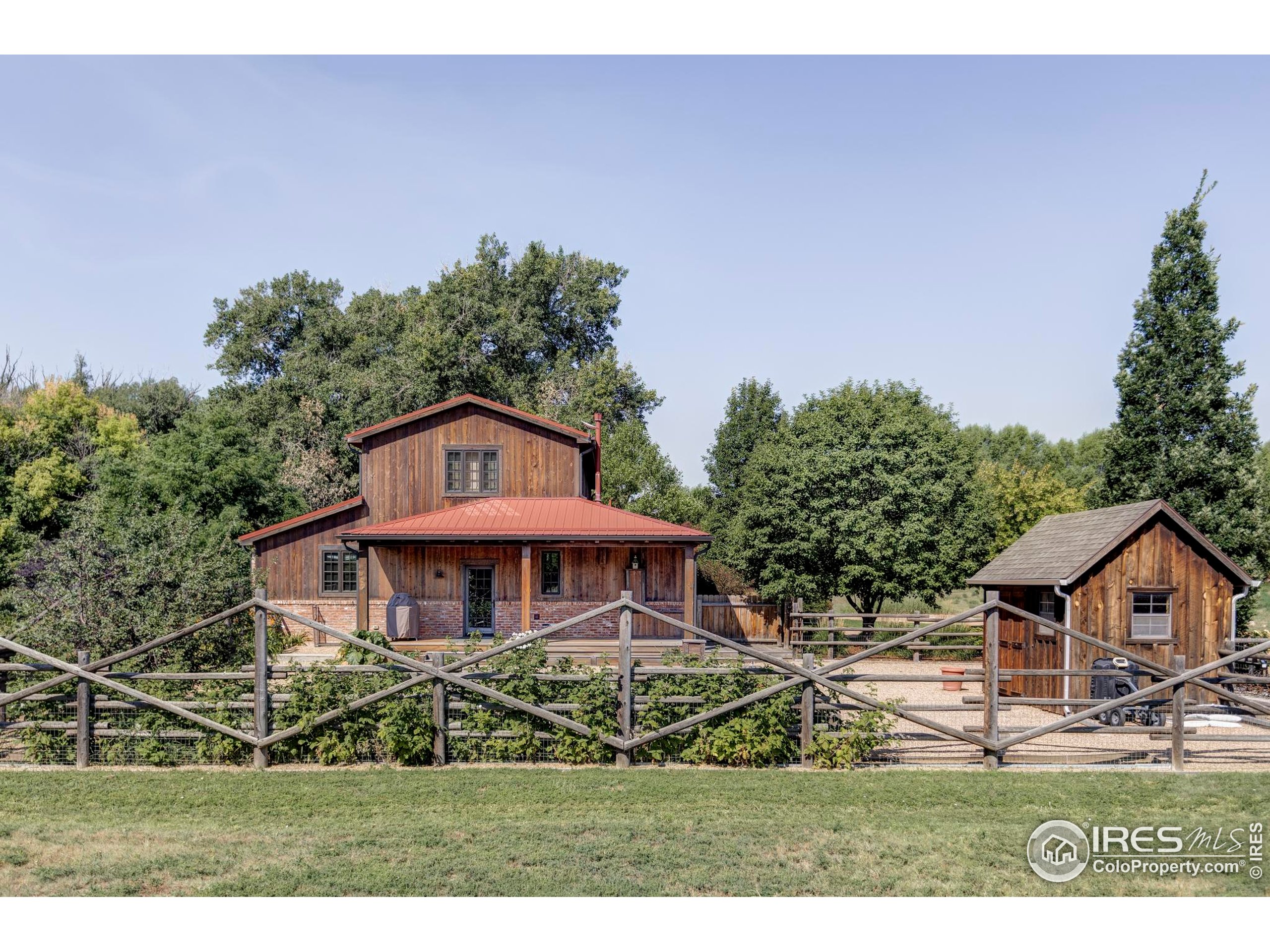 15789 North 83rd Street Longmont, CO 80503 - Photo 16 of 40 a front view of a house with a yard