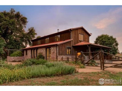 a view of house with backyard and entertaining space