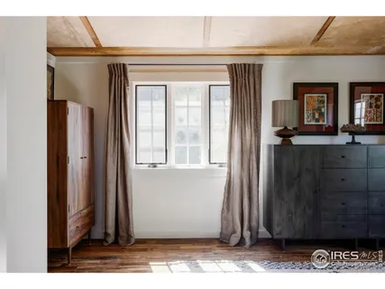 a view of a door and a window