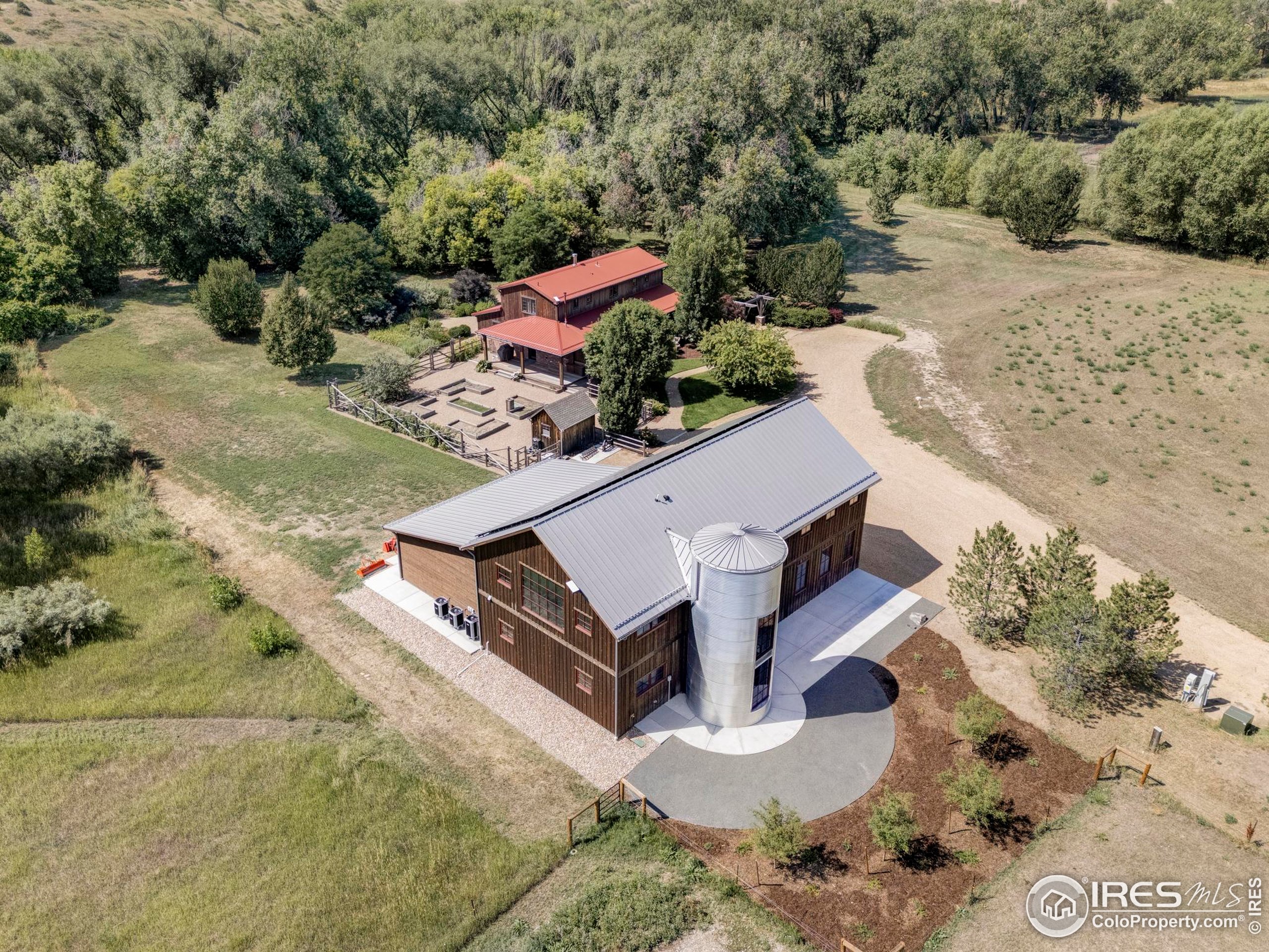 15789 North 83rd Street Longmont, CO 80503 - Photo 27 of 40 an aerial view of a house with a yard