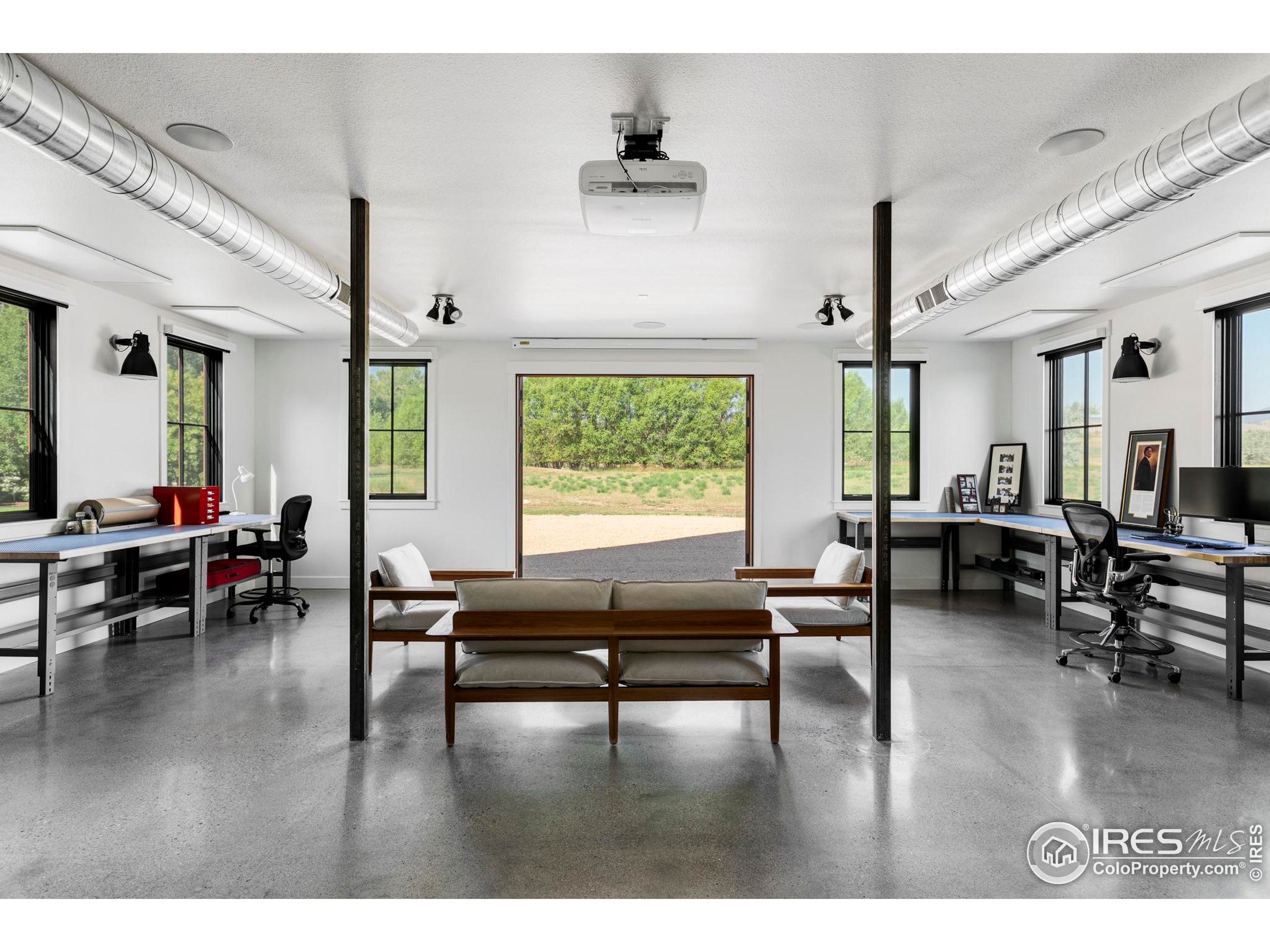 15789 North 83rd Street Longmont, CO 80503 - Photo 30 of 40 a living room with furniture and a large window