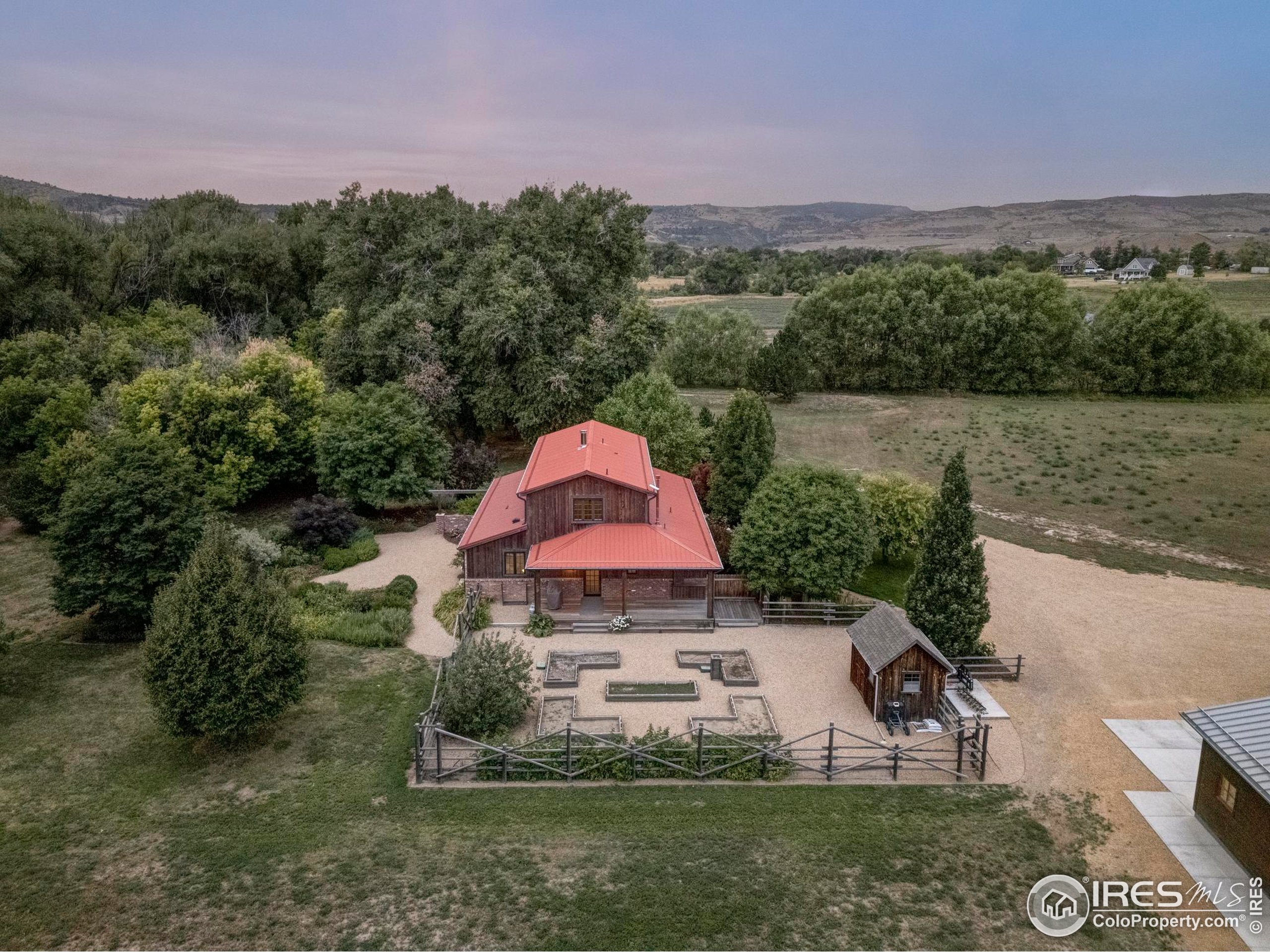 15789 North 83rd Street Longmont, CO 80503 - Photo 39 of 40 a aerial view of a house with a yard and a fountain