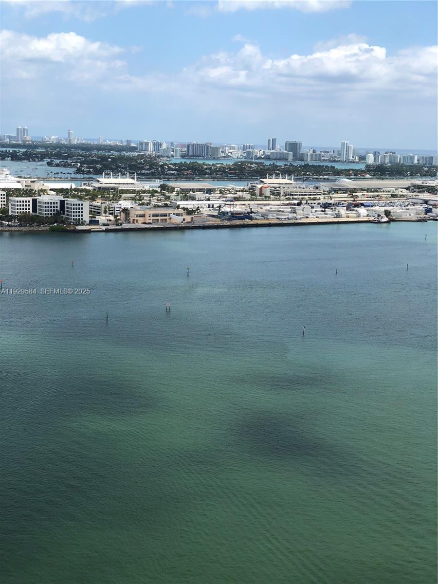 900 Brickell Key Boulevard, Unit 1602 Miami, FL 33131 - Photo 7 of 12 a view of a city