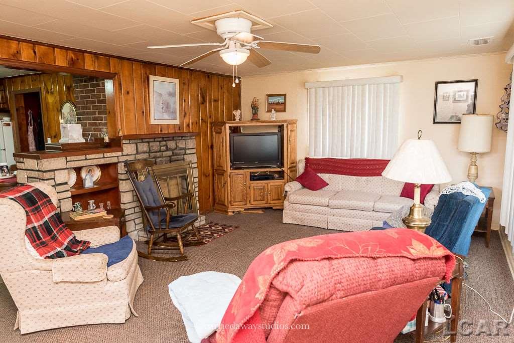 785 Manitou Road Manitou Beach, MI 49253 - Photo 11 of 23 Living room Fireplace