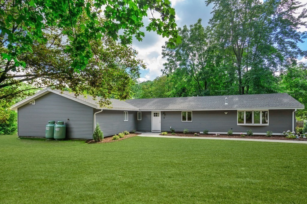 3 Emerson Road Wayland, MA 01778 - Photo 1 of 24 a front view of house with yard and green space