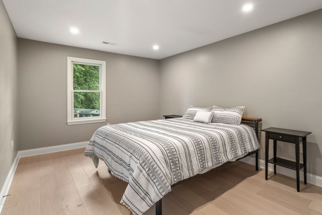 3 Emerson Road Wayland, MA 01778 - Photo 14 of 24 a bedroom with a bed and a window