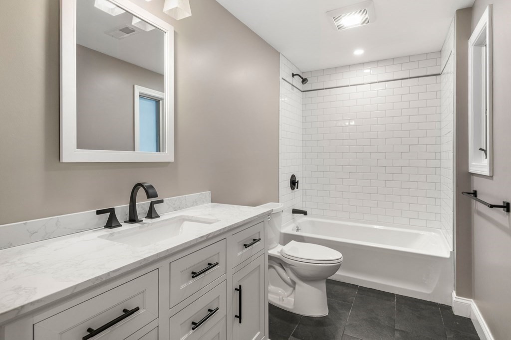 3 Emerson Road Wayland, MA 01778 - Photo 15 of 24 a bathroom with a sink a toilet and shower