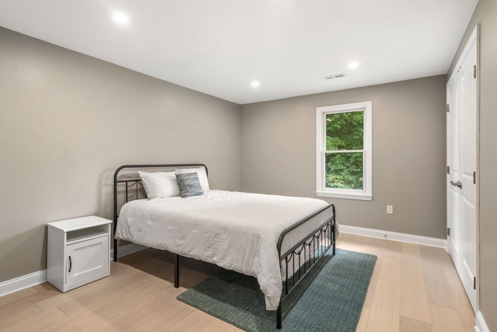 3 Emerson Road Wayland, MA 01778 - Photo 16 of 24 a bedroom with a bed and a window