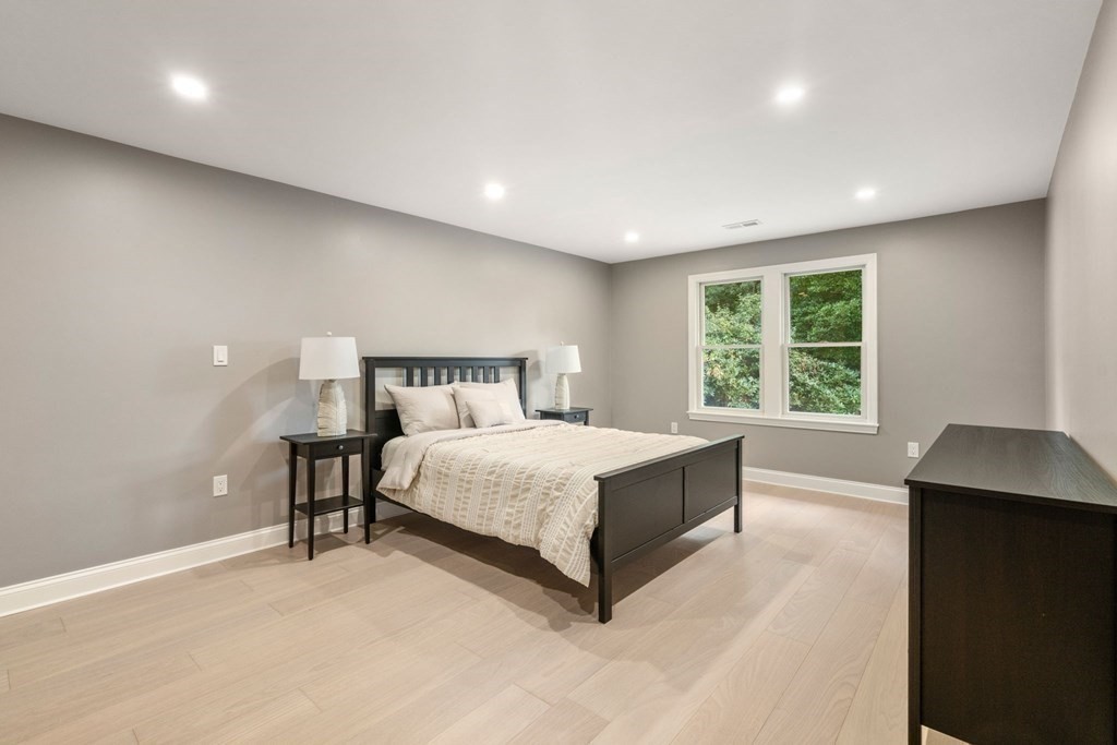 3 Emerson Road Wayland, MA 01778 - Photo 17 of 24 a bedroom with a bed and a window