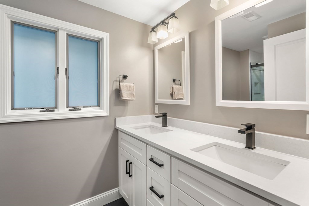 3 Emerson Road Wayland, MA 01778 - Photo 19 of 24 a bathroom with a sink and mirror