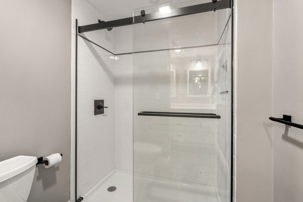 3 Emerson Road Wayland, MA 01778 - Photo 20 of 24 a bathroom with a glass shower door