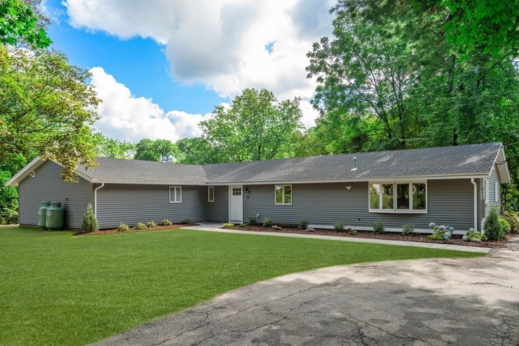 3 Emerson Road Wayland, MA 01778 - Photo 2 of 24 a front view of house with yard and green space
