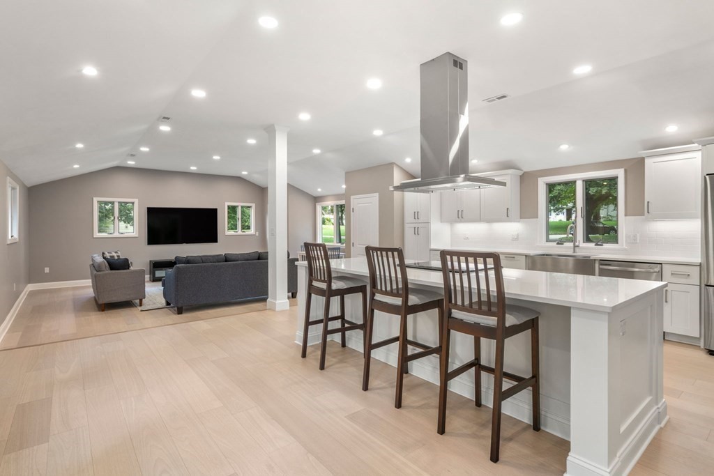 3 Emerson Road Wayland, MA 01778 - Photo 4 of 24 a view of a livingroom with furniture and a flat screen tv