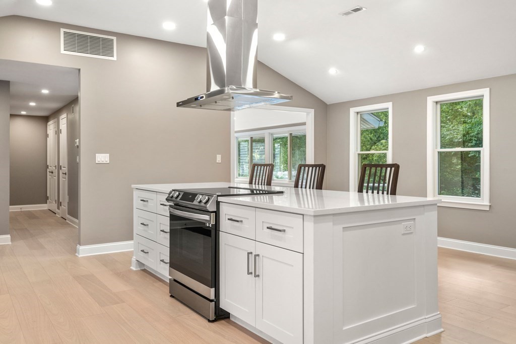3 Emerson Road Wayland, MA 01778 - Photo 9 of 24 a kitchen with stainless steel appliances granite countertop a stove and a sink
