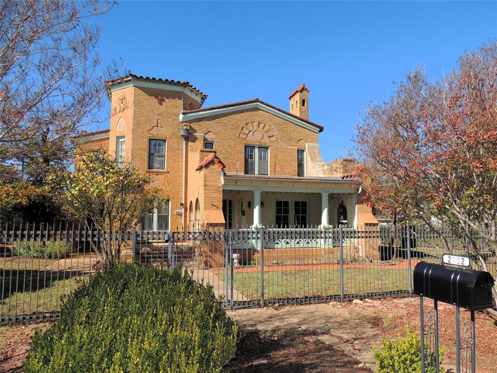 a front view of a house with parking