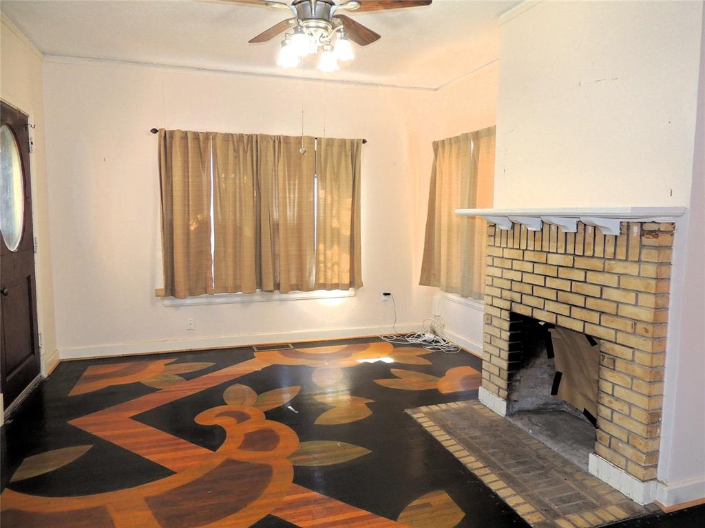 2102 Swenson Street Abilene, TX 79603 - Photo 18 of 40 a view of livingroom with furniture and fireplace