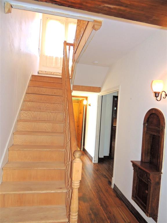 2102 Swenson Street Abilene, TX 79603 - Photo 22 of 40 a view of entryway with wooden floor and stairs