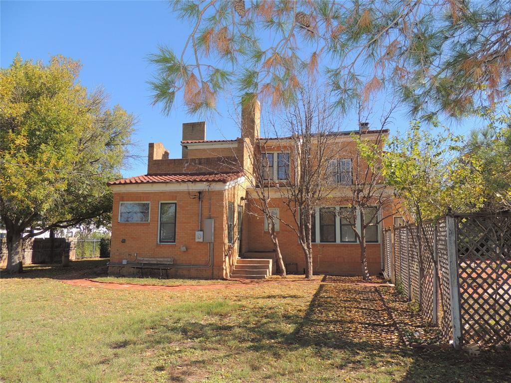 2102 Swenson Street Abilene, TX 79603 - Photo 33 of 40 a front view of a house with a yard