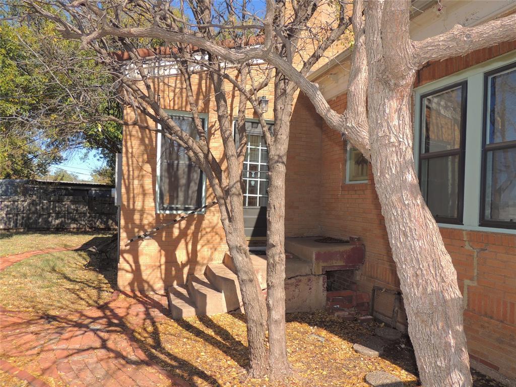 2102 Swenson Street Abilene, TX 79603 - Photo 34 of 40 a view of a house with a tree