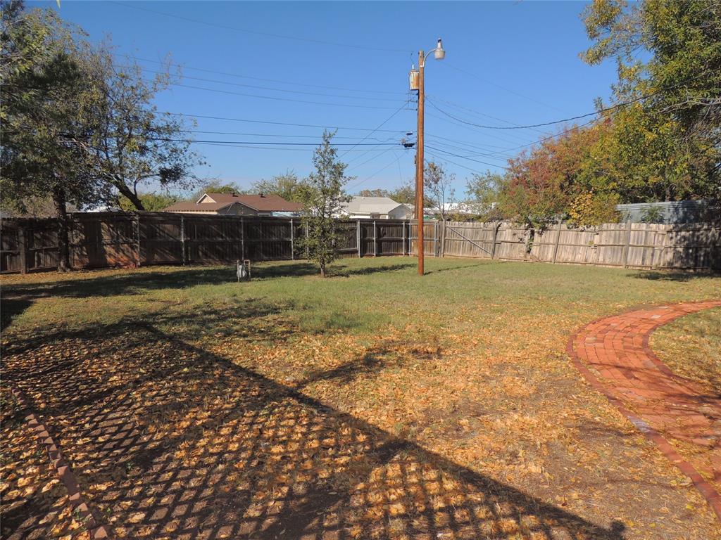 2102 Swenson Street Abilene, TX 79603 - Photo 35 of 40 a view of a house with a yard