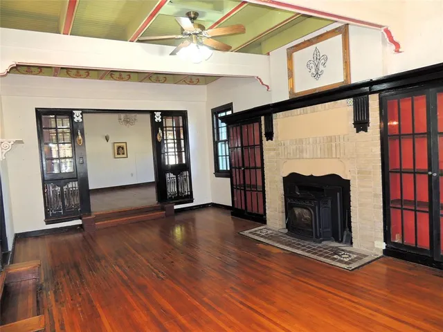 a view of livingroom with furniture and a fireplace