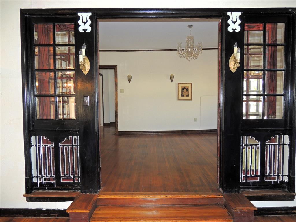 2102 Swenson Street Abilene, TX 79603 - Photo 8 of 40 a view of washer and dryer with a hallway