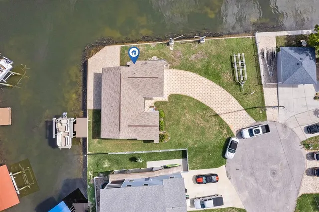 an aerial view of residential building with parking space