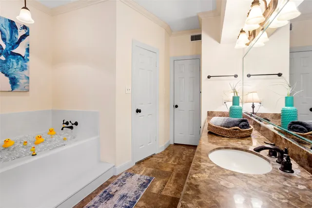 a bathroom with a sink a bathtub and a shower