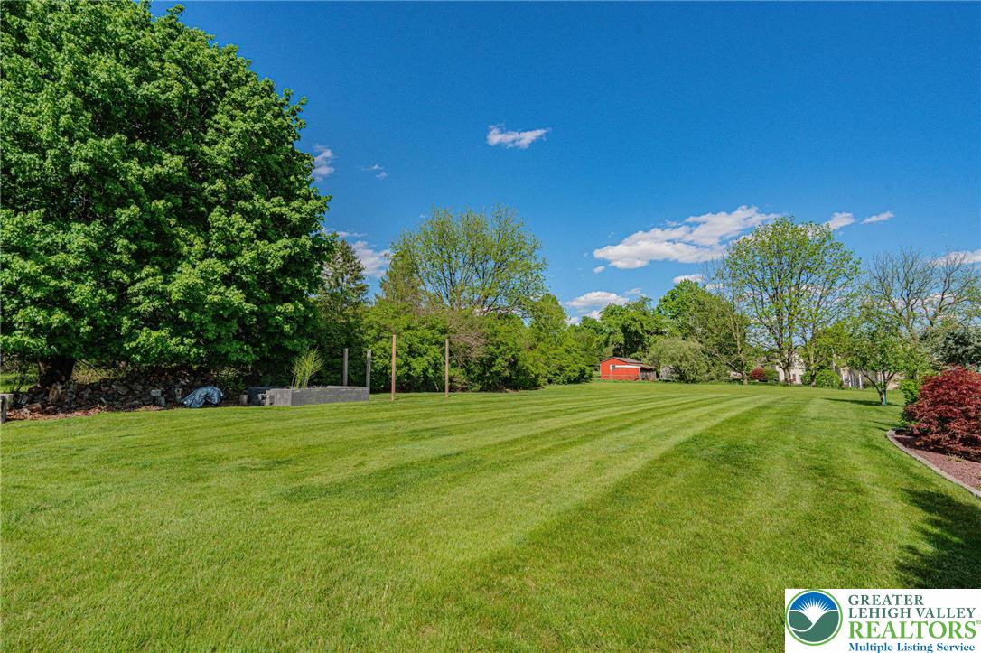 6551 Overlook Road Orefield, PA 18069 - Photo 75 of 82 a view of a grassy field with trees