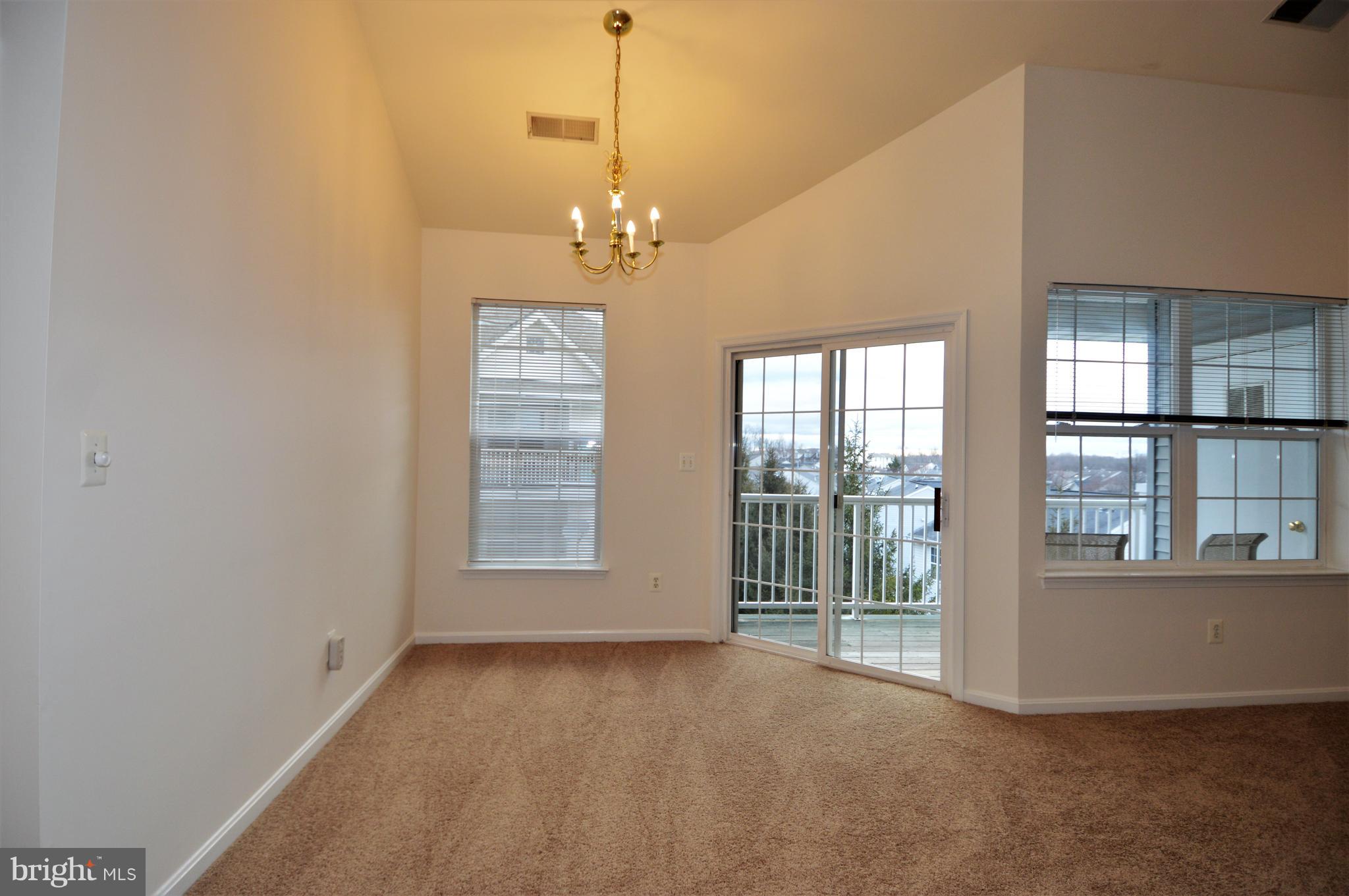 23 Hawk Rise Lane, Unit 302 Owings Mills, MD 21117 - Photo 11 of 51 Dining Room w/New Carpet