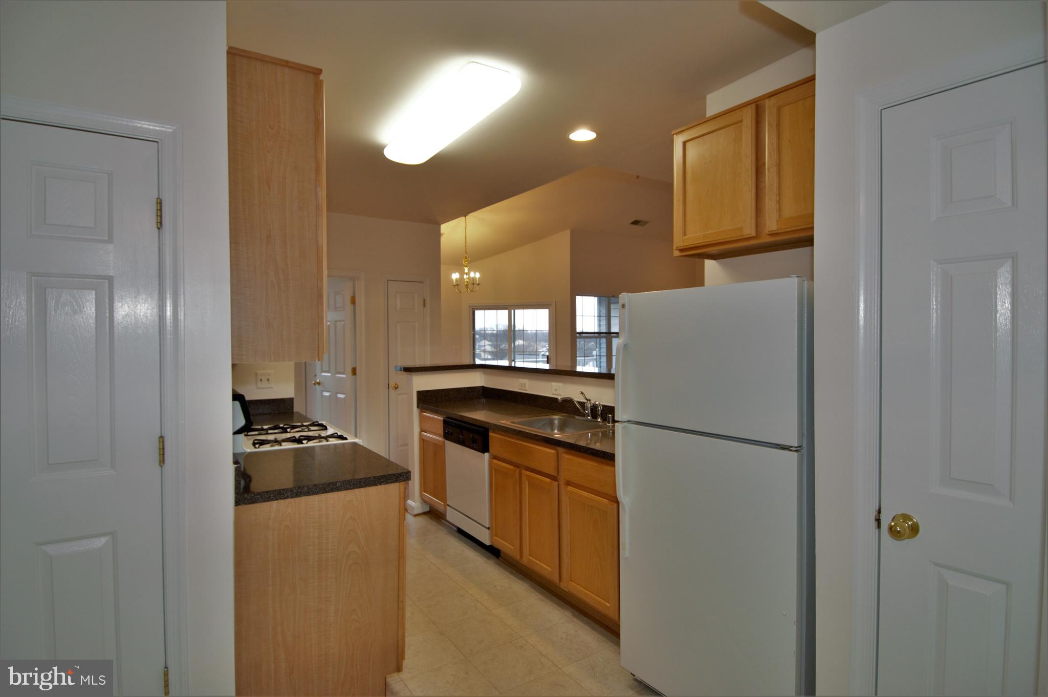23 Hawk Rise Lane, Unit 302 Owings Mills, MD 21117 - Photo 43 of 51 Another kitchen View