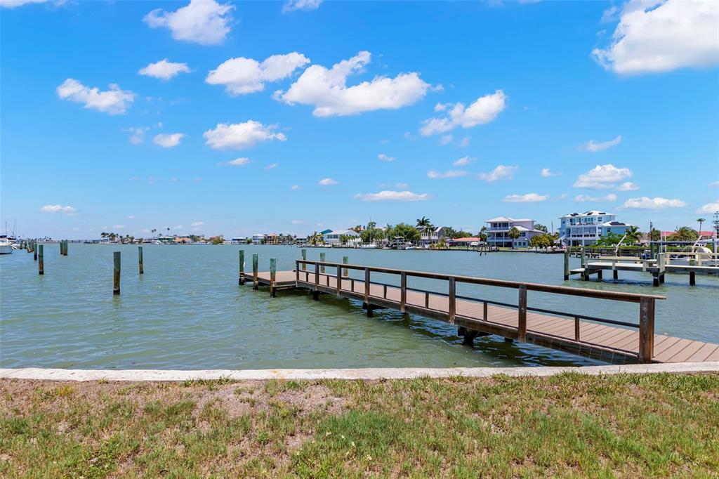 708 Sunset Cove Madeira Beach, FL 33708 - Photo 50 of 61 a view of a lake with houses