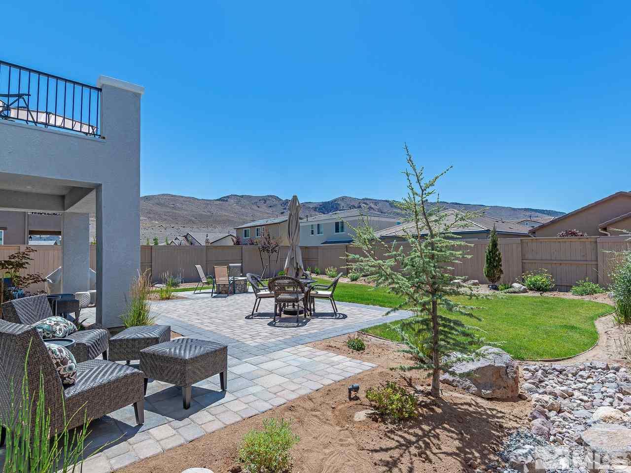 3110 Show Jumper Lane Reno, NV 89521 - Photo 11 of 28 a view of a patio with a table and chairs