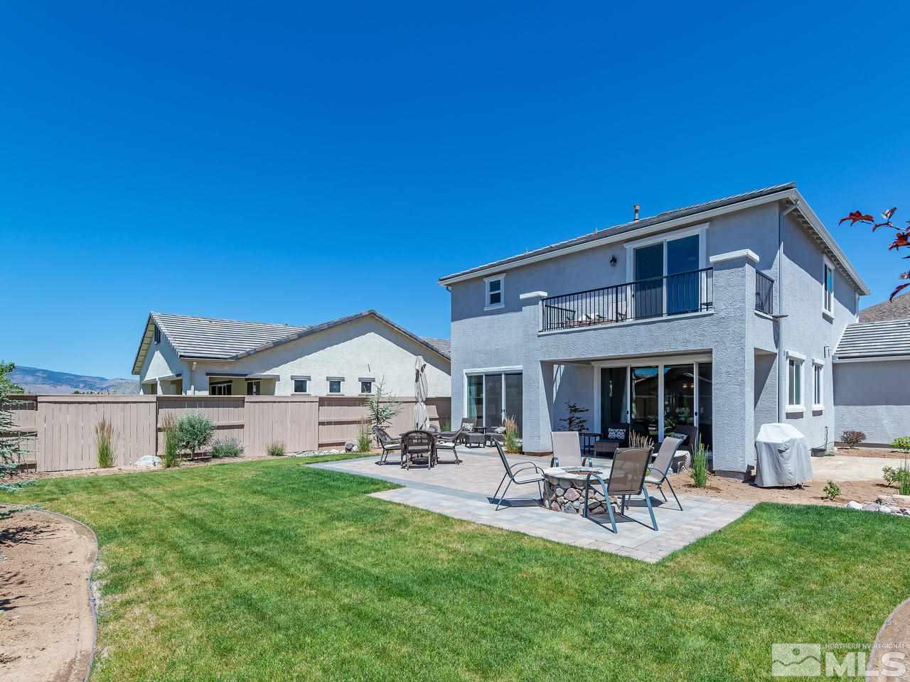 3110 Show Jumper Lane Reno, NV 89521 - Photo 12 of 28 a front view of a house with garden and sitting area