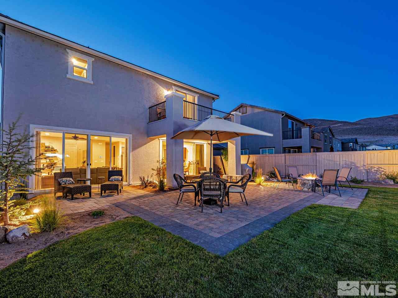 3110 Show Jumper Lane Reno, NV 89521 - Photo 17 of 28 a view of a house with backyard porch and sitting area