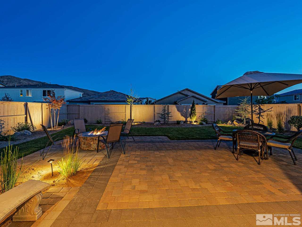 3110 Show Jumper Lane Reno, NV 89521 - Photo 19 of 28 a view of a swimming pool with a patio