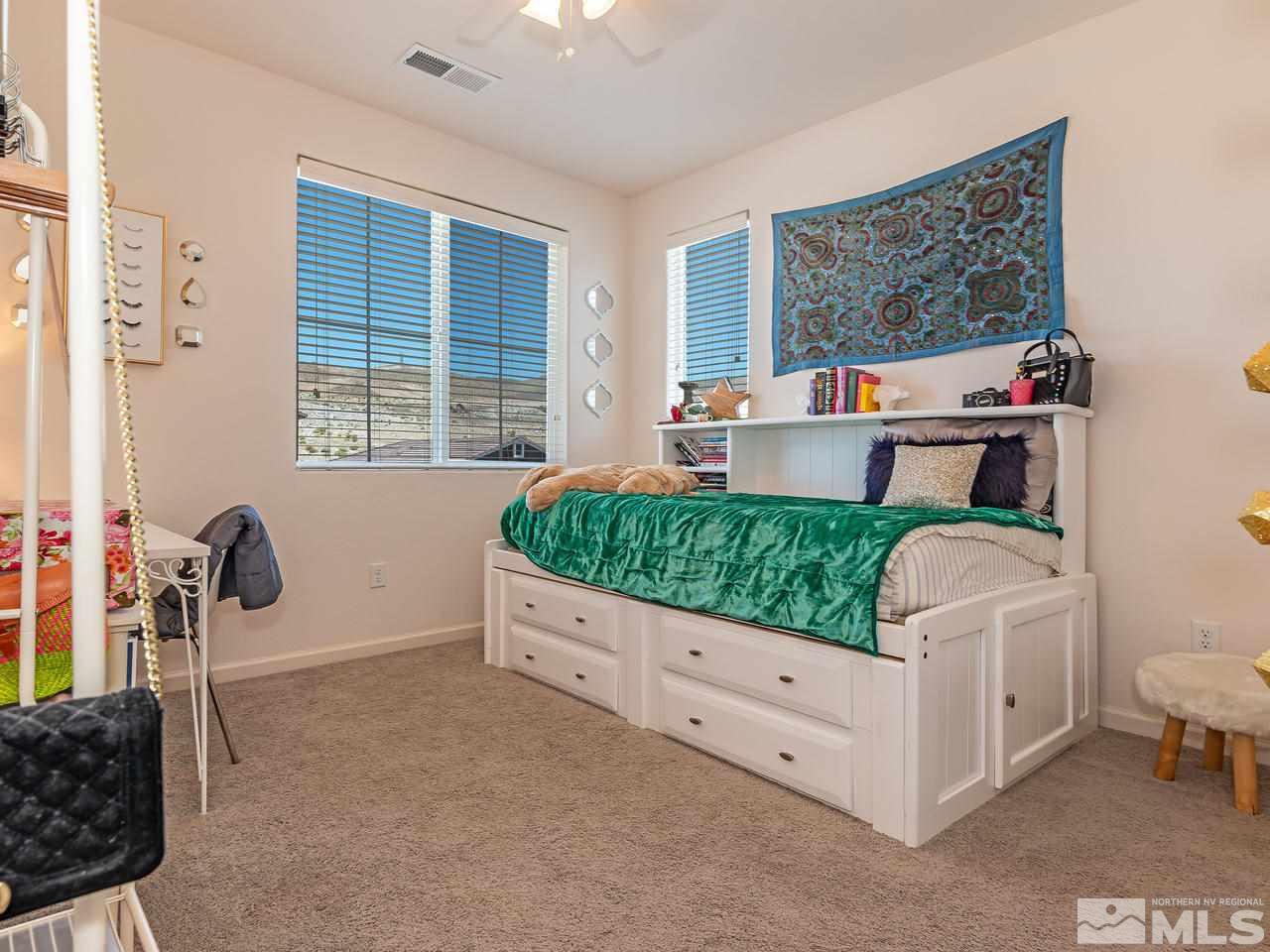 3110 Show Jumper Lane Reno, NV 89521 - Photo 25 of 28 a living room with furniture and a window