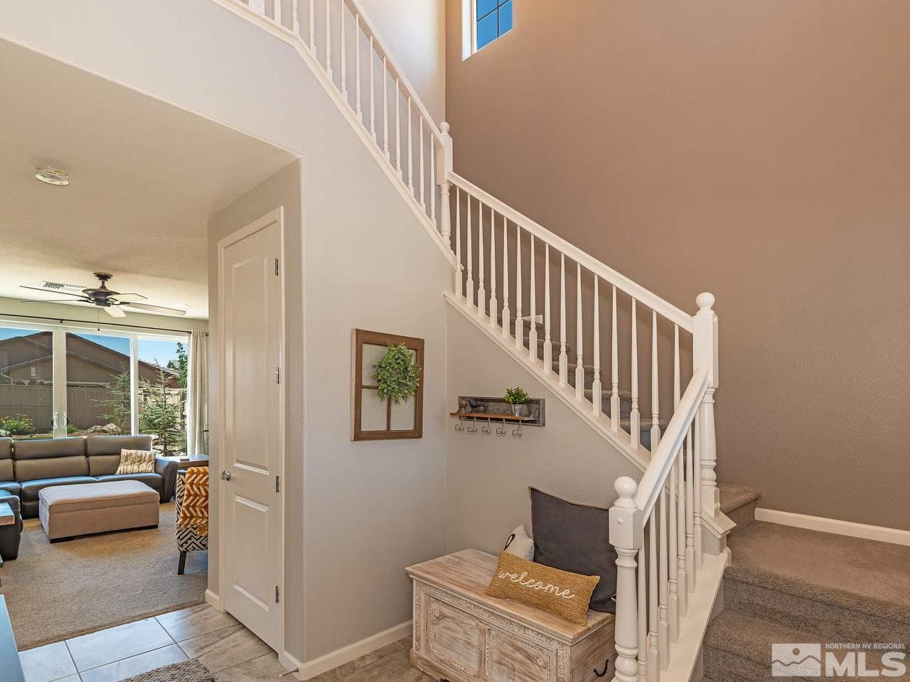3110 Show Jumper Lane Reno, NV 89521 - Photo 3 of 28 a view of entryway and hall with wooden floor