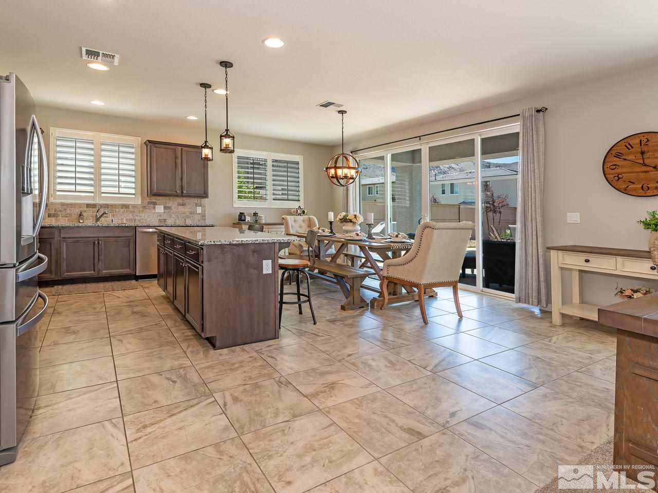 3110 Show Jumper Lane Reno, NV 89521 - Photo 5 of 28 a room with lots of tables and chairs
